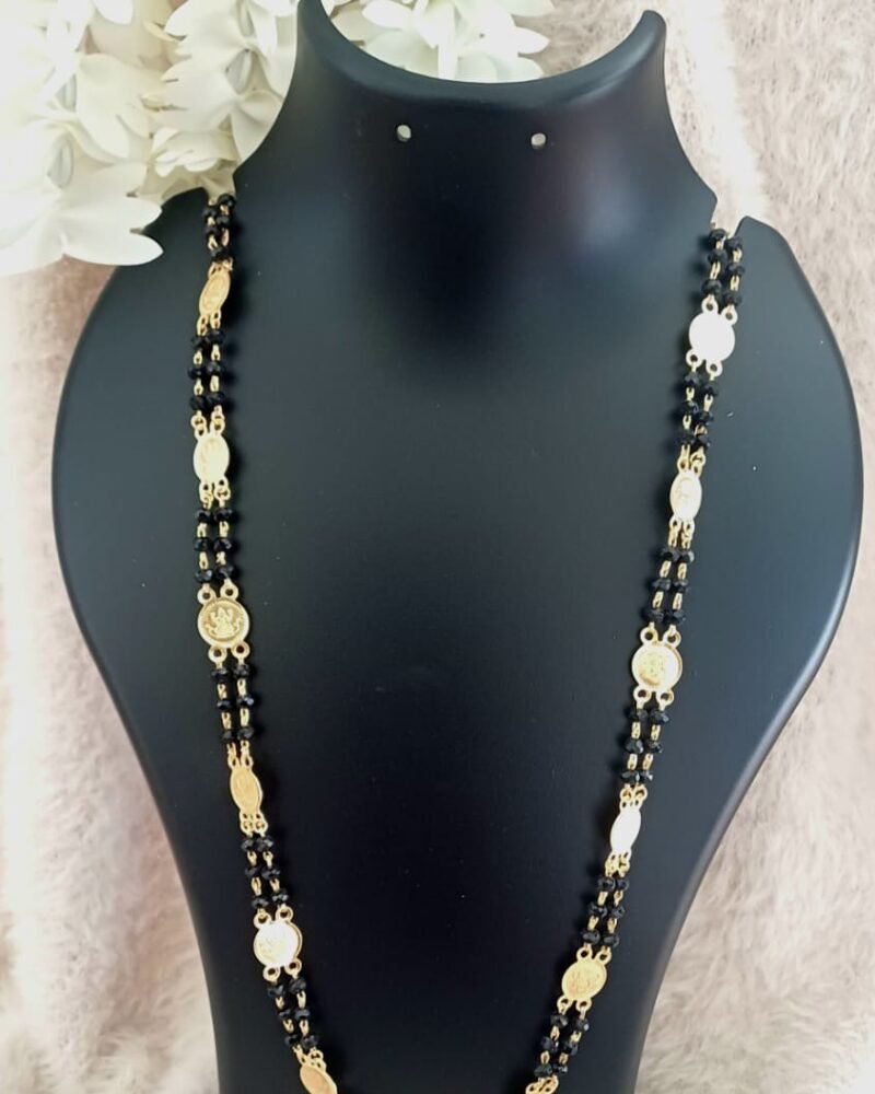 Black beads with gold coin